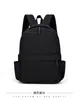 Mochila casual para hombres y mujeres, mochila impermeable de color liso, mochila escolar ligera de gran capacidad para estudiantes, mochila elegante para mujeres