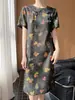 Vestido de Verano/Primavera 2026 Nuevo Estilo Chino de Satén con Cuello Redondo de Manga Corta para Mujer, Estampado, Abotonado, de Longitud Media