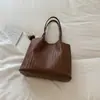 Bolso tote de gran capacidad con patrón tejido muy elegante, nuevo bolso casual de color liso para hombro/bajo del brazo, principios de otoño 2026