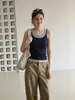Sexy camisola de estilo americano de dos piezas falsas de alta gama impresionante para mujer, top ajustado sin mangas de verano para llevar solo o debajo