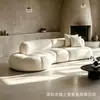 Sofá estilo diseñador de celebridad de internet sofá de tela curvo minimalista sala de modelos casa de huéspedes asientos grandes combinación de sofá para persona perezosa