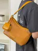 Bolso tejido de nicho súper popular para mujer, nuevo modelo 2026, versátil para el trabajo, bolso de hombro y cruzado, bolso tipo cubo de moda de alta gama