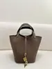 2025 Nuevo de Gama Alta Cuero TC Herrajes de Acero Cosido Semi-a Mano Hilo Encerado Bolso Cesta de Moda Versátil Bolso de Hombro Tipo Cubo