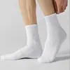 Calcetines deportivos lisos unisex de algodón de Xinjiang 7A, antibacterianos, para todas las estaciones, cortos, medianos y largos, resistentes al olor, transpirables, al por mayor