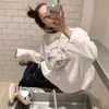 Camiseta suelta de manga larga estilo coreano para mujer, otoño e invierno 2025, seda de leche, top de longitud media estilo ins, venta al por mayor transfronteriza para mujer