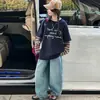 Conjunto de Sudadera Falso de Dos Piezas para Niñas Primavera y Otoño 2026 Nuevo Estilo Coreano Elegante Conjunto Casual de Dos Piezas con Jeans para Niña