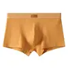 Venta al por mayor de ropa interior de algodón para hombre Huajielong de color liso texturizado, bóxers transpirables de cintura media para tallas grandes, disponibles para dropshipping