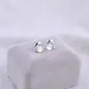 Pendientes Pequeños Exquisitos de Piedra Ojo de Gato de Delfín Diseño Sencillo de Nicho Moda de Lujo Ligero Únicos Versátiles