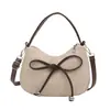Bolso de mujer con diseño de nicho único 2026 nuevo bolso cruzado versátil bolso de mano exquisito bolso de mano de moda super popular