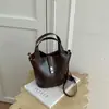 Bolsa saco de alta qualidade, com design de nicho para mulheres, nova coleção 2026, adequada para o dia a dia, pode ser usada como bolsa transversal, bolsa de mão ou bolsa de ombro