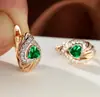 Pendientes transfronterizos de circón en forma de corazón, pendientes versátiles de nicho de lujo ligero incrustados de diamantes en forma de corazón