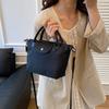 Bolso Retro de Primavera y Verano Bolso Cubo 2026 Diseño de Nicho de Moda Bolso de Nylon para Mujer Versátil Hombro Cruzado Bolso Dumpling