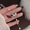 Collar de borlas de perlas y mariposas de lujo ligero, estilo dulce y fresco, para mujer, elegante y dulce, moda nicho de alta gama con un ambiente juvenil