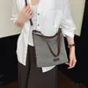 Bolsa feminina de nicho de alta qualidade 2026 nova outono versátil casual transversal, bolsa de balde de ombro único super popular