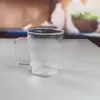 Caneca de café de vidro em formato de estrela fina