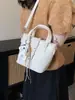 Bolso tipo cubo súper popular para mujer 2026 nueva moda bolso cruzado versátil bolso de mano pequeño de moda para verano