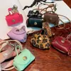 Mini Bolsa Retro de Cuero con Correa para Auriculares Billetera para Monedas Moda Femenina Linda Billetera para Monedas Accesorios de Collar Largo