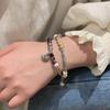 Pulsera de seguridad con piedra de ámbar vintage para mujer, pulsera de cuentas exquisita de nicho de lujo ligero, nuevo estilo chino para parejas y amigas