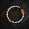 [Estilo Completo] Pulsera Vibratoria Caliente de Semilla de Pasión de Círculo Único para Hombre, Pulsera de Semilla de Ciprés con Rostro Fantasma de Xizang, Frijol Dorado Pequeño