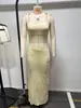 Verano 2025 Nuevo Traje Sexy de Dos Piezas con Falda Larga y Top Halter Ajustado al Cuerpo Estilo Europeo y Americano Estación Independiente Transfronteriza para Mujer