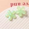Flor de ciruelo semi-transparente con polvo de brillo de cinco pétalos accesorios de resina para manualidades pendientes colgante pasador material para funda de teléfono móvil venta al por mayor