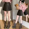 Shorts de couro feminino 2026 outono e inverno novo casual saia-calça versátil meia-saia saia curta de couro shorts de cintura alta saia calça de bota