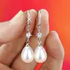 2025 Nuevo Estilo Caliente Pendientes de Moda de Lujo Accesible Ganchos de Oreja Únicos y Exquisitos Pendientes de Perla y Circonita Estilo Ins
