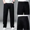 Jeans negros de alta gama para hombre, pantalones rectos holgados para hombre, nuevo modelo de otoño 2026, pantalones largos casuales de negocios para mediana edad