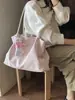 Bolso de hombro de gran capacidad con estampado de leopardo, nuevo bolso de axila para el trabajo, bolso versátil de moda casual de alta gama de nicho para mujer