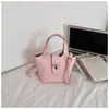 Bolso único y elegante para mujer, nuevo modelo primavera 2026, bolso tipo cubo simple, bolso de hombro y cruzado, bolso madre-hija