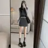 Saia curta de lã estilo coreano para mulheres, novo modelo outono e inverno 2026, cintura alta, modeladora, petite, saia lápis A-line de terno cinza