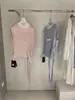 Wgwe8939 Ropa de Mujer Guangzhou Shisanxing Verano Nuevo Estilo Elegante Gama Alta Corbata en la Cintura Sin Mangas Camisa Top