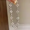 Pulsera Popular de Trébol de Cuatro Hojas tipo Estrella de Xiaohongshu 2025 Nueva Moda Lujo Accesible Flor de Trébol de Cuatro Hojas con Diamantes Completos Joyería Elegante para la Mano