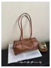 Bolsa de mano moderna retro al por mayor transfronteriza para mujer, nuevo estilo, bolsa Boston de lujo ligero francés, bolsa de hombro cruzado niche para debajo del brazo