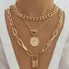 Set de Collares de Venta Caliente Transfronterizo Europeo y Americano Forma de Candado Lujo Ligero Temperamento Medalla Redonda Colgante en Relieve Hebilla de Ot Collar Multicapa Venta al por Mayor
