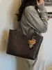 Bolso tote de hombro único de alta gama transfronterizo para mujer, nuevo patrón tejido de moda, gran capacidad, para ir al trabajo, bolso tipo cesta para debajo del brazo