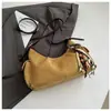 Bolso bandolera retro de nicho coreano tipo bolsa de albóndiga para mujer Otoño 2025 Nuevo Bolso de hombro cruzado moderno y simple de alta gama