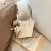 Elegante Bolsa Cesta de Verduras para Mujer 2026 Otoño Nueva Moda de Gama Alta Bolso de Hombro Cruzado con Temperamento Bolso de Mano Tipo Cubo