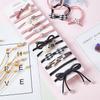 Ins Celebridad de Internet Juego Combinado de 12 Piezas Cuerda para el Cabello Estilo Coreano Pulsera Simple Banda para el Cabello Banda para el Cabello para Mujer Fabricantes