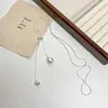 Colar Casual Puxar Longo Coração Pérola Franja Feminino Corrente de Clavícula de Luxo Acessível High-End Corrente para Suéter Outono e Inverno