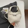 Bolso de mano pequeño de moda con estampado de lichi transfronterizo para mujer, nueva colección 2026, bolso tote para el trabajo, bolso tipo cubo, bolso cruzado moderno y elegante