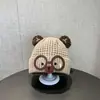 Bonitos y adorables gorros de otoño e invierno para niños, con diseño de poner, material de punto y una serie de dibujos animados, que brindan abrigo y protección para los oídos para bebés y niños pequeños.