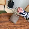 Bolso de Lipstick de Cuero de Vaca de Primera Capa con Cuello Halter, Bolso para Auriculares, Bolso de Monedas de Almacenamiento con Hebilla de Clip Versátil y Exquisito, Tarjetero Mini Estilo Coreano