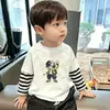 Camiseta de manga larga para niño, nuevo modelo primavera y otoño 2026, camiseta básica holgada para niños, top a rayas para niños, otoño
