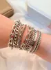 Bestseller transfronteiriço europeu e americano: Pulseira circular geométrica de várias camadas com nó de onda para mulheres, acessório simples e versátil