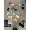 Liquidación, Sin Devoluciones ni Cambios. Camiseta sin mangas de tirantes básica clásica versátil elástica estilo coreano de verano para mujer 11028