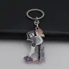 Venta caliente metal esmalte color pareja novios Dibujos animados Creativo Coche bolsa llavero de metal Colgante de joyería