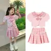 Terno Feminino Roupas de Verão 2025 Novo Verão Uniforme JK Infantil Saia Plissada Estilo Preppy Menina Conjunto de Duas Peças Super Fofo