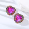 Pendientes exagerados europeos y americanos, pendientes de aleación con forma de corazón de diamantes transfronterizos, pendientes de cadena de garra elegantes con diamantes superbrillantes para mujer de moda.
