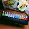Pendientes de gota de crisoprasa incrustada, pendientes de hebilla de paz de crisoprasa blanca, estilo nicho, pendientes de jade de crisoprasa de lujo ligero